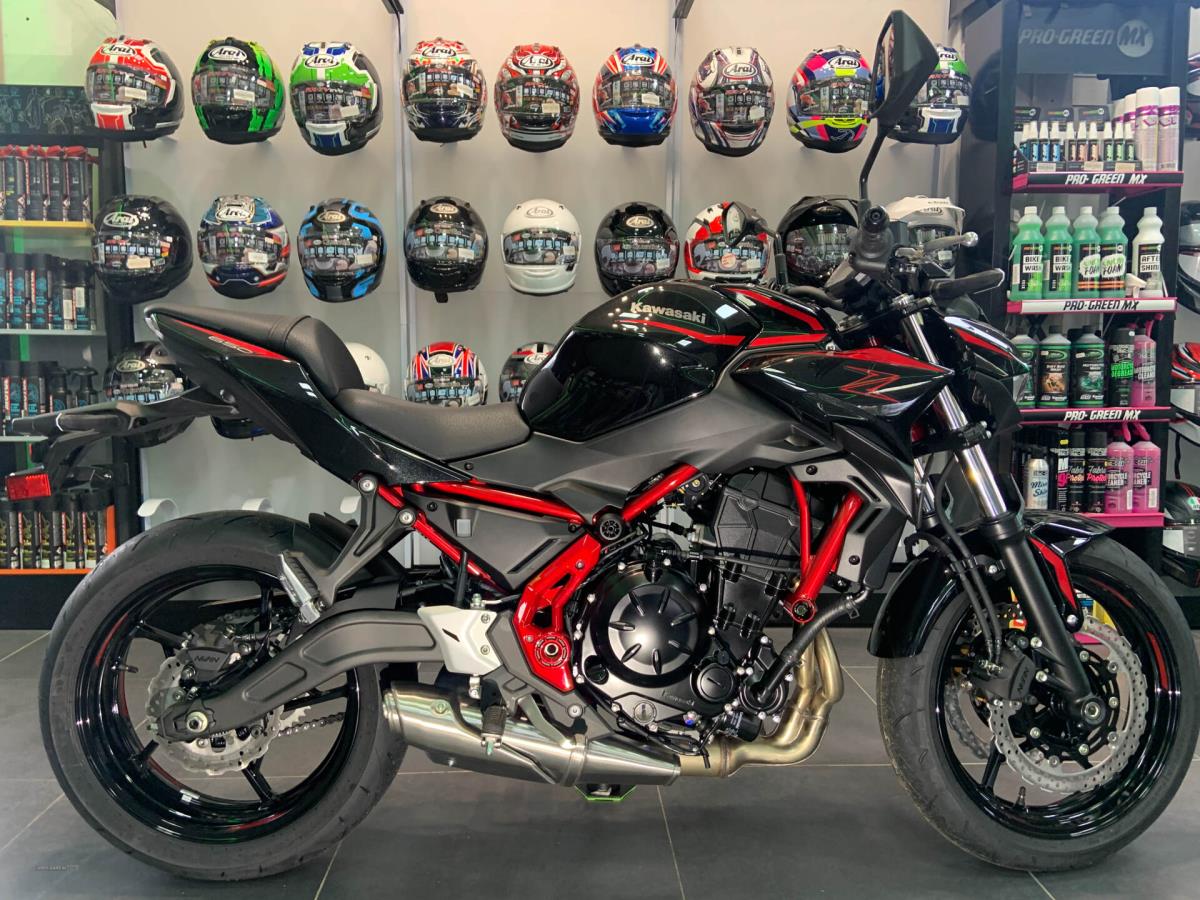 Main image of 0% FINANCE AVAILABLE 2025 KAWASAKI Z650 IN CANDY PERSIMMON RED