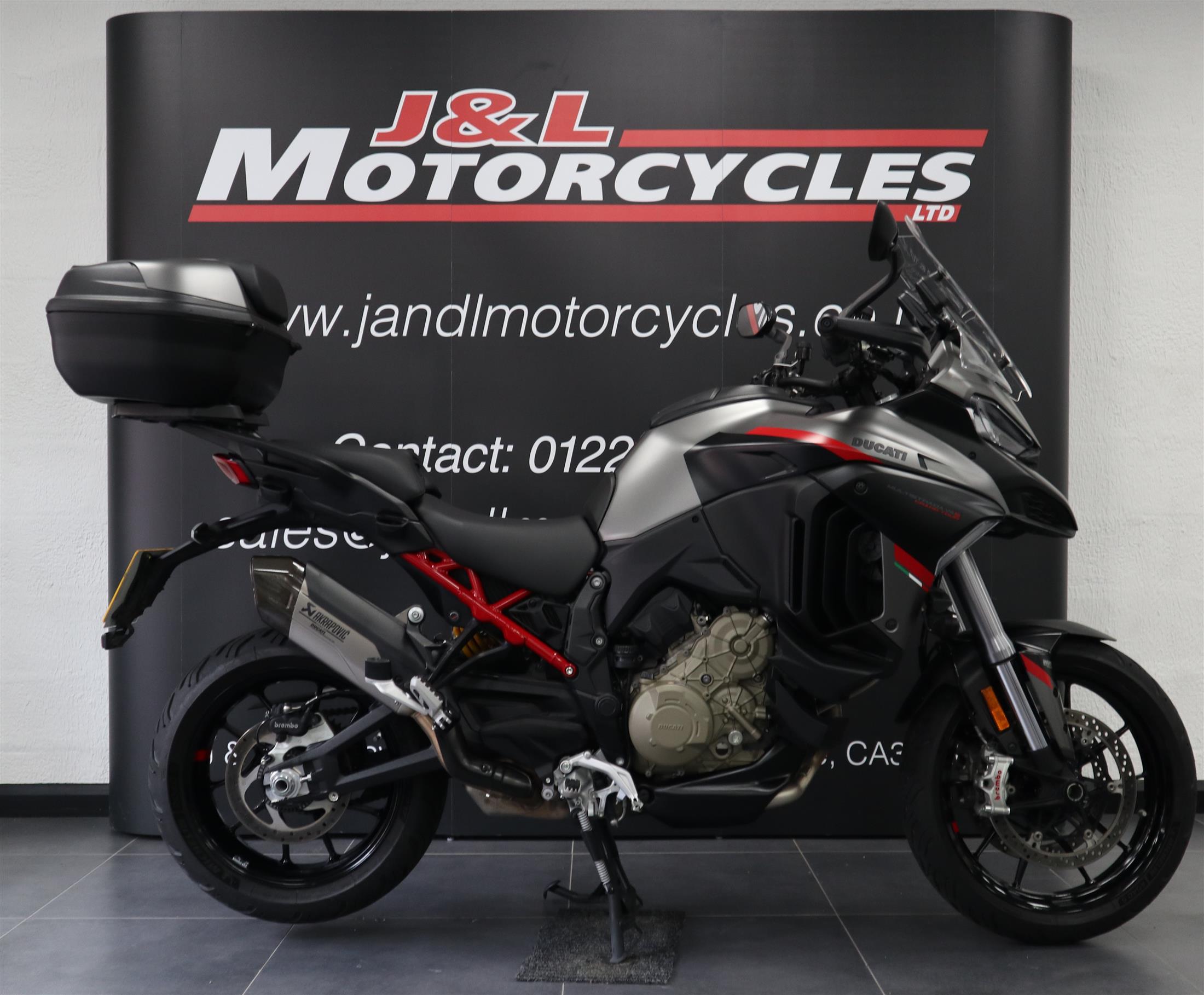 Multistrada V4 S  Grand Tour. Akrapovic end can. Excellent condition.